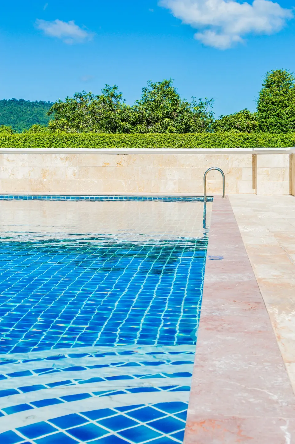 Tiled edge and coping detail of an outdoor pool